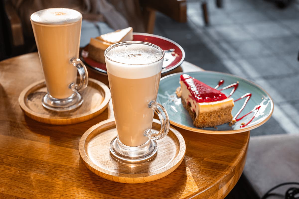 classic new york cheesecake and coffee latte on a 2024 12 09 03 35 47 utc 1